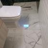 Remodelación Baño Providencia con porcelanato marmoleado