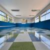 Instalación Piso Vinílico VCT en Colegio de Til Til